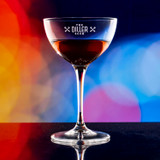 Wholesale engraved 8 oz. Bartender Novecento Martini customized with The Diller Room logo on a bokeh background