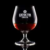 Wholesale engraved 18 oz. Brandy Snifter Glass customized with Catoctin Creek Distilling logo on a black background