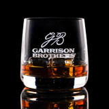 Wholesale engraved 10.5 oz. Sequence Old Fashioned Glass customized with Garrison Brothers Distillers logo on a black background