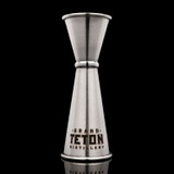 Wholesale engraved Premium Stainless Steel Japanese Jigger customized with Grand Teton Distilling logo on a black background