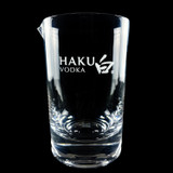 Wholesale engraved Cristallo Mixing Glass customized with Haku Vodka Logo on a black background