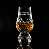Wholesale engraved Crystal Cut Glencairn Whisky Glass customized with Smooth Ambler logo on a black background