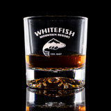 Wholesale engraved 10.5 oz. Snowflake Rocks Glass customized with Whitefish Mountain Resort logo on a black background