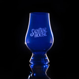 Wholesale engraved blue Glencairn blind tasting glass customized with The Sazerac House logo on a black background