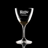 Wholesale engraved 5.75 oz. Stolzle Nick & Nora Glass customized with Ketel One logo on a black background