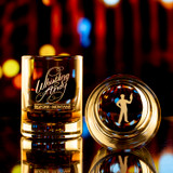 Wholesale engraved 3 oz. Lexi Big Shot customized with Whistling Andy Distilling logo on a bokeh background
