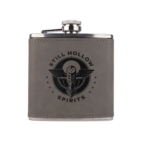 Wholesale engraved 6 oz. Gray Ultrahyde Flask customized with Still Hollow Spirits logo on a white background