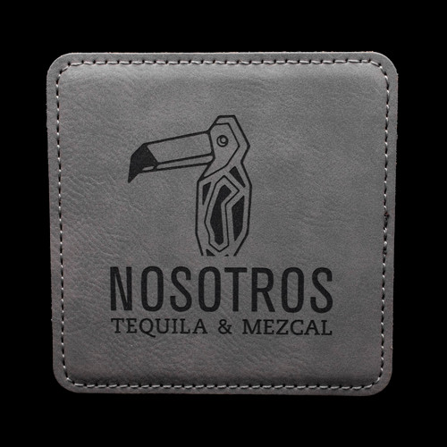 Wholesale engraved Gray Square Coaster customized with Nosotros Tequila logo on a black background