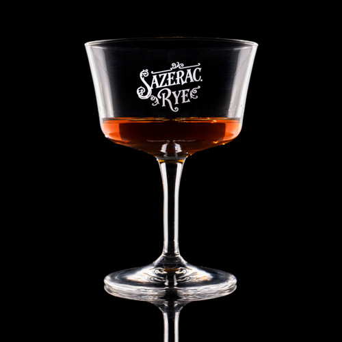 Wholesale engraved 7.5 oz. Bartender Fizz Glass customized with Sazerac Rye logo on a black background