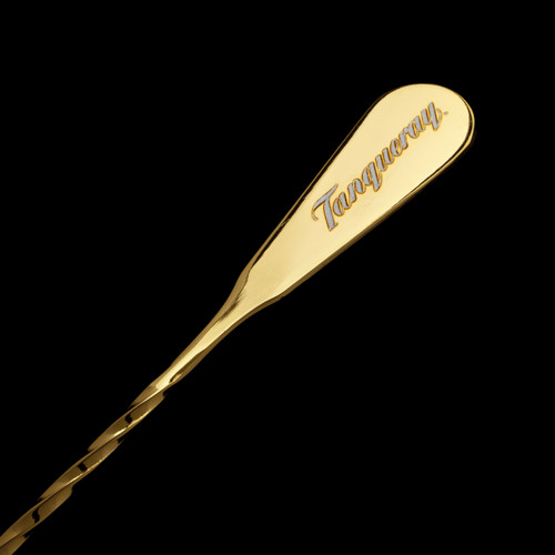Wholesale engraved Gold Bar Spoon customized with Tanqueray logo on a black background