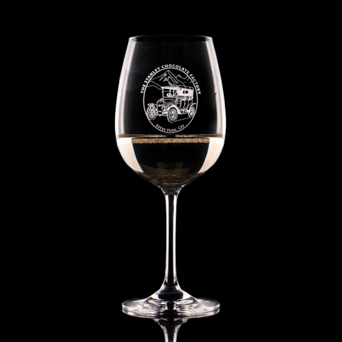 Wholesale engraved 15 oz. Stolzle Weinland Wine Glass customized with The Stanley Chocolate Factory logo on a black background