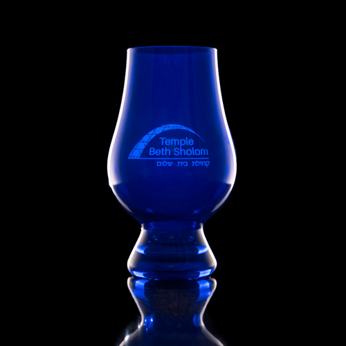 Wholesale engraved  blue Glencairn blind tasting glass customized with Temple Beth Shalom logo on a black background