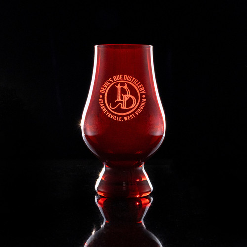 Wholesale engraved Red Glencairn blind tasting glass customized with Devils Due Distillery logo on a black background