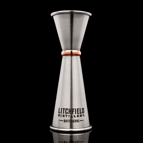 Wholesale engraved Japanese Jigger customized with Litchfield Distilling logo on a black background