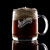 Wholesale engraved Nordic Whisky Glass Mug customized With Backwards Distillers logo on a black background