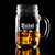 Wholesale engraved 16 oz. Glass Mason Mug customized with Dickel Whisky logo on a black background
