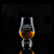 Wholesale engraved Wee Glencairn Glass customized with Casey Jones Distillers logo on a black background