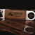 Wholesale engraved Rum Bottle Opener customized with Litchfield Distilling logo on a black background