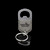 Wholesale engraved Oval Gray Keychain Bottle Opener customized with Joshua Tree Distillery logo on a black background