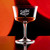 Wholesale engraved 7.5 oz. Bartender Fizz Glass customized with Sazerac Rye logo on a bokeh background