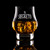 Wholesale engraved 8.5 oz. Masters Reserve Glass customized with El Secreto logo on a black background