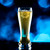 Wholesale engraved 16 oz. Pub Pilsner Glass customized with Yerlo logo on a bokeh background