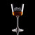 Wholesale engraved 5.5 oz. Romeo Nick & Nora Glass customized with Hard Truth Distillers logo on a black background