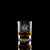 Wholesale engraved 1.5 oz. Venus Shot Glass customized with EOD Distillers logo on a black background