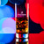 Wholesale engraved 14.25 oz. Stolzle New York Collins Glass customized with St Petersburg Distillers logo on a bokeh background