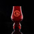 Wholesale engraved Red Glencairn blind tasting glass customized with Devils Due Distillery logo on a black background