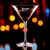 Wholesale engraved 9 oz. New York Martini Glass customized with Ketel One Vodka logo on a bokeh background