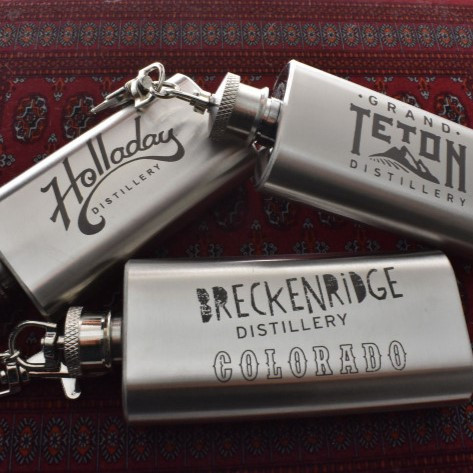 Wholesale engraved 2 oz. Pocket Flask with various client logos
