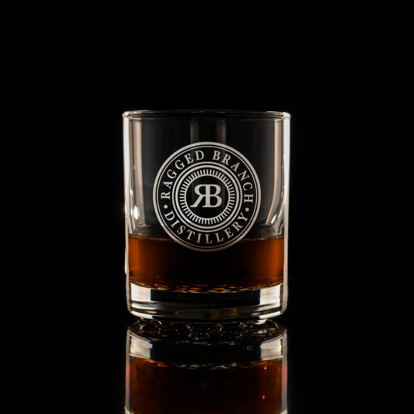 Wholesale engraved 7.75 oz. Nob Hill glass customized with Ragged Branch Distillers logo on a black background