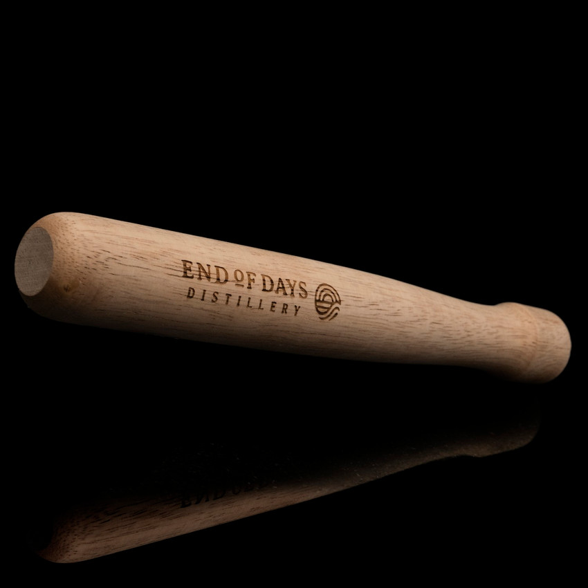 Wholesale engraved 9" Natural Wood Muddler customize with EOD Distilling logo on a black background