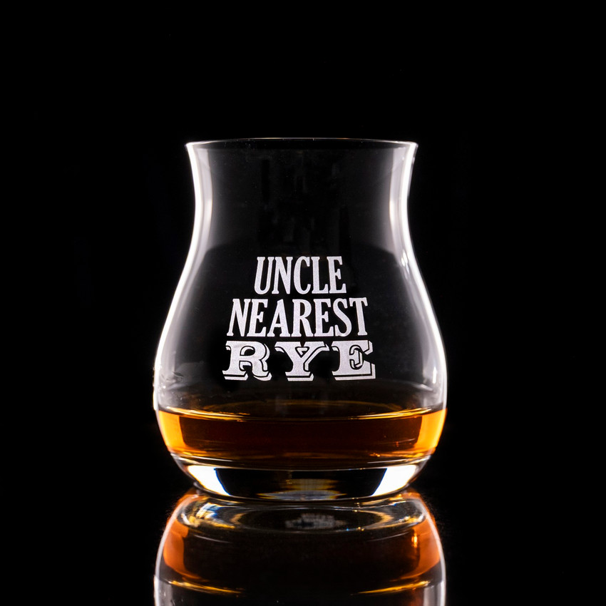 Wholesale engraved Glencairn Mixer Glass customized with Uncle Nearest Rye logo on a black background