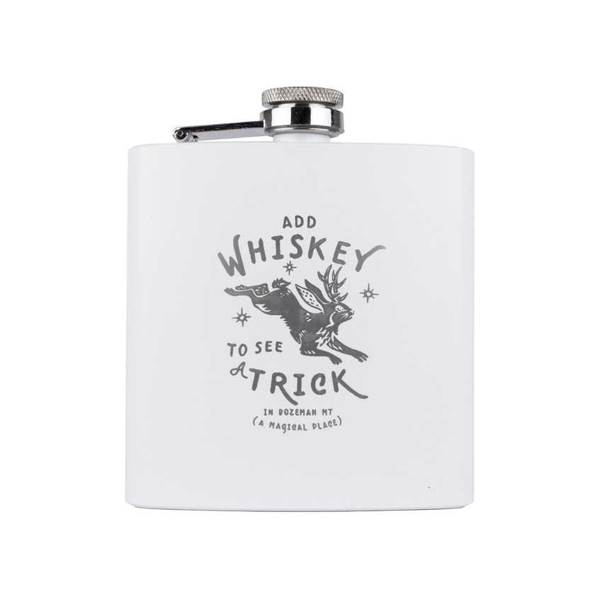 Wholesale engraved 6 oz. Snow White Powder Coated Flask customized with Whiskey Trick logo on a white background