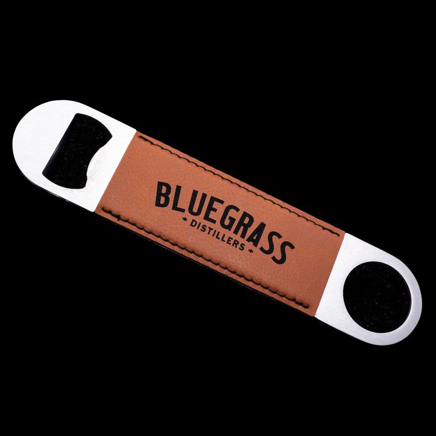 Wholesale engraved Cognac Bottle Opener customized with Bluegrass Distillery logo on a black background