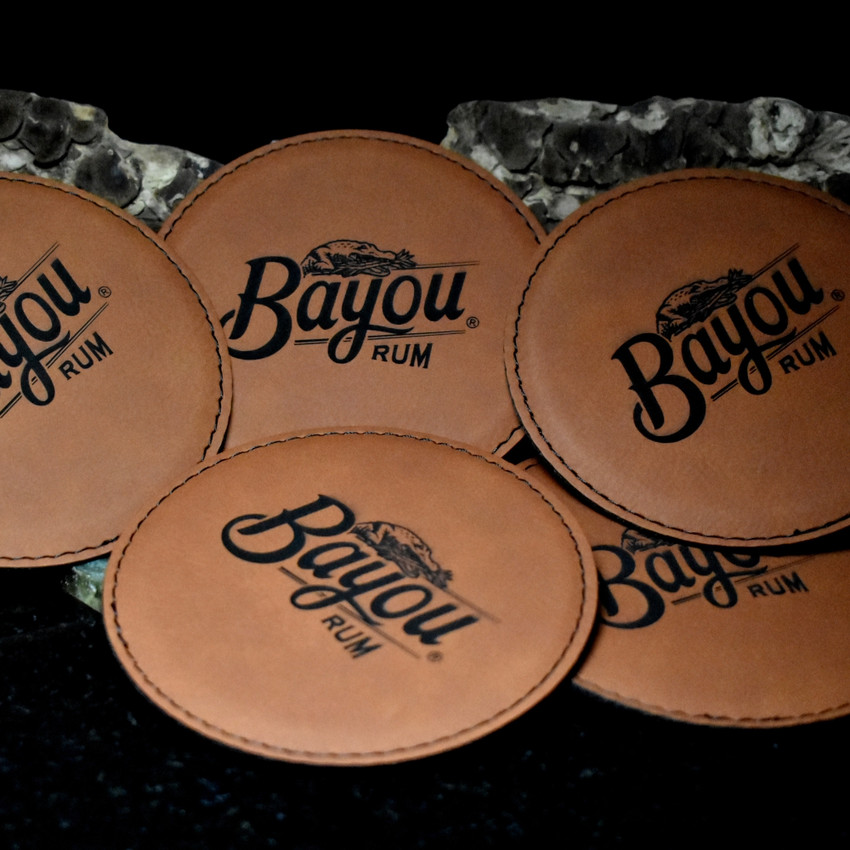 Wholesale engraved Cognac Round Coaster customized with Bayou Rum logo