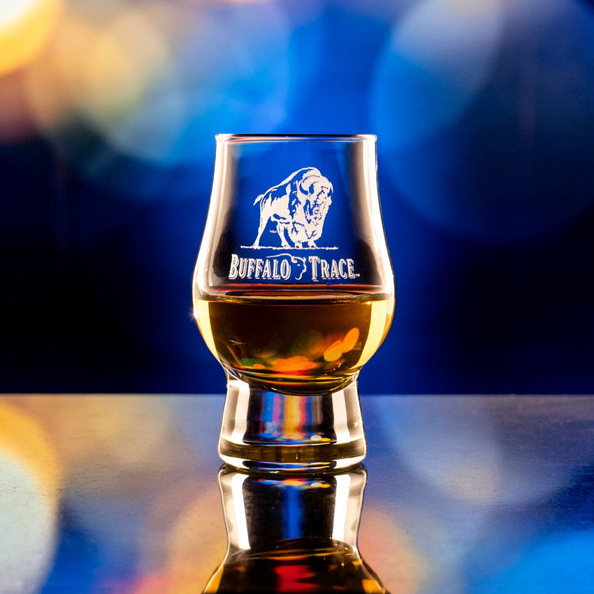 Wholesale engraved 3.5 oz. Urban Bar Perfect Dram customized with Buffalo Trace logo on a bokeh background