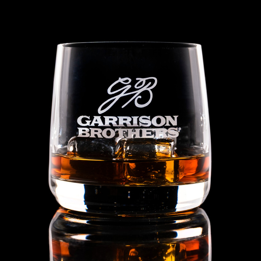 Wholesale engraved 10.5 oz. Sequence Old Fashioned Glass customized with Garrison Brothers Distillers logo on a black background