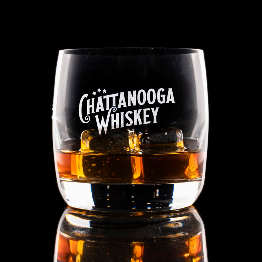 Wholesale engraved 10.5 oz. Nordic Nuevo Rocks Glass customized with Chattanooga Whiskey logo on a black background
