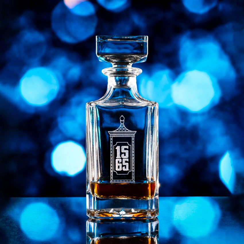 Wholesale engraved 16 oz. Pint-Sized Whiskey Decanter customized with City Gate logo on bokeh background