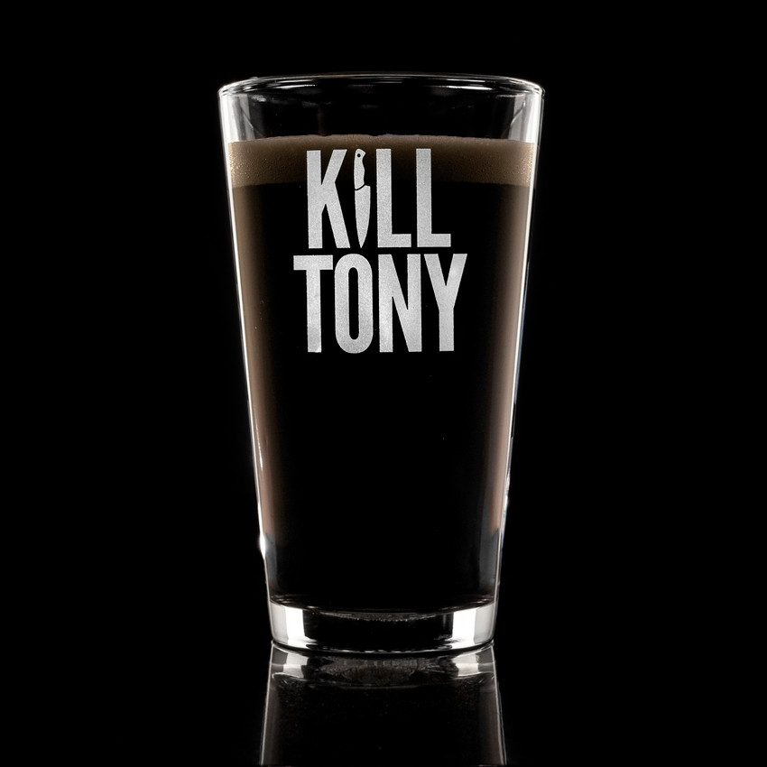 Wholesale engraved 16 oz. Classic Pint Glass customized with Kill Tony logo on a black background