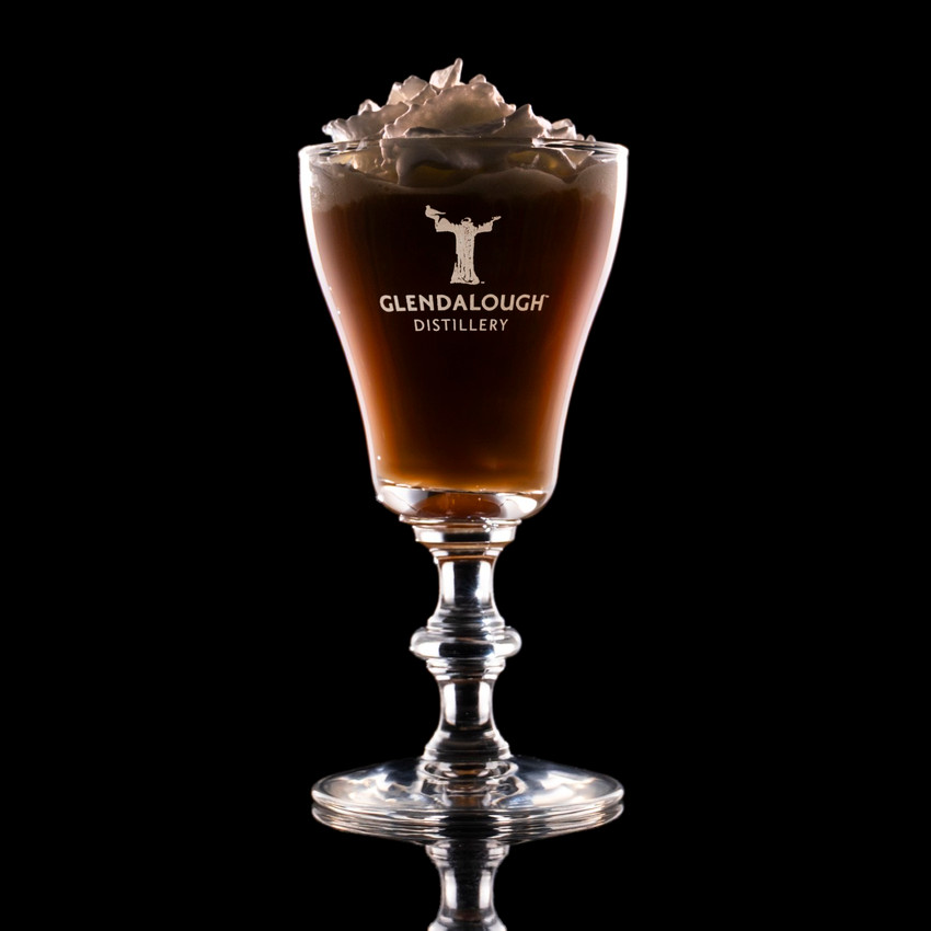 Wholesale engraved Georgian Irish Coffee Glass customized with Glendalough Distillers logo on a black background