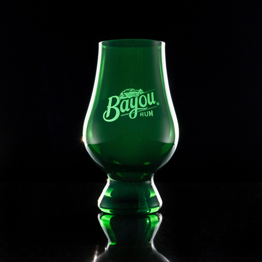 Wholesale engraved Green Glencairn blind tasting glass customized with Eagle Rare Whiskey logo on a black background