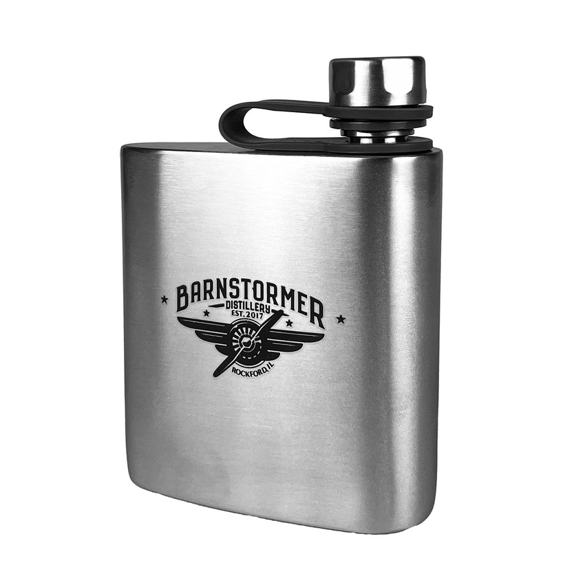 Wholesale engraved 6 oz. Wingman Flask customized with Barnstormer Distillery logo on a white background