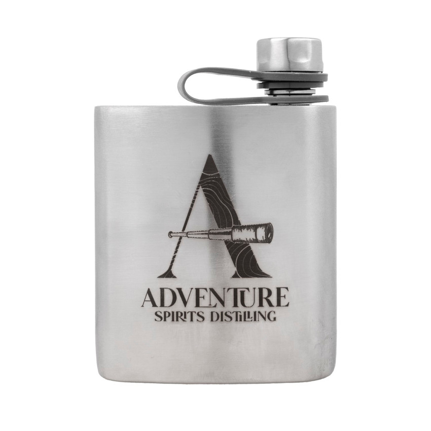 Wholesale engraved 6 oz. Wingman Flask customized with Adventure Distilling logo on a white background