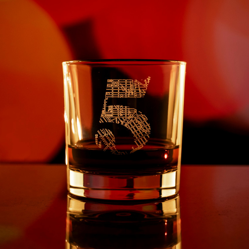Wholesale engraved 11.5 oz. Classic Old Fashioned Glass customized with Patent 5 logo bokeh background