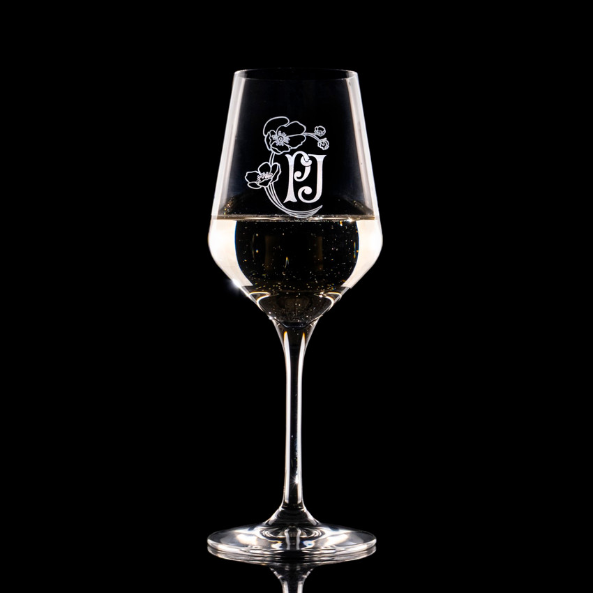 Wholesale engraved 12.75 oz. Revolution Wine Glass customized with PJ Flower logo on a black background