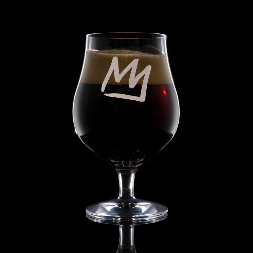 Wholesale engraved 16.75 oz. Stolzle Berlin Beer Glass customized with Mammoth Mountain logo on a black background